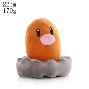 Orange and Gray Stuffed Animal Toy